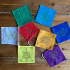 Prayer flags with Tibetan symbols of good fortune
